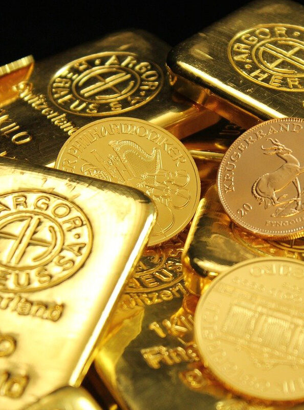Goldmünzen und Barren